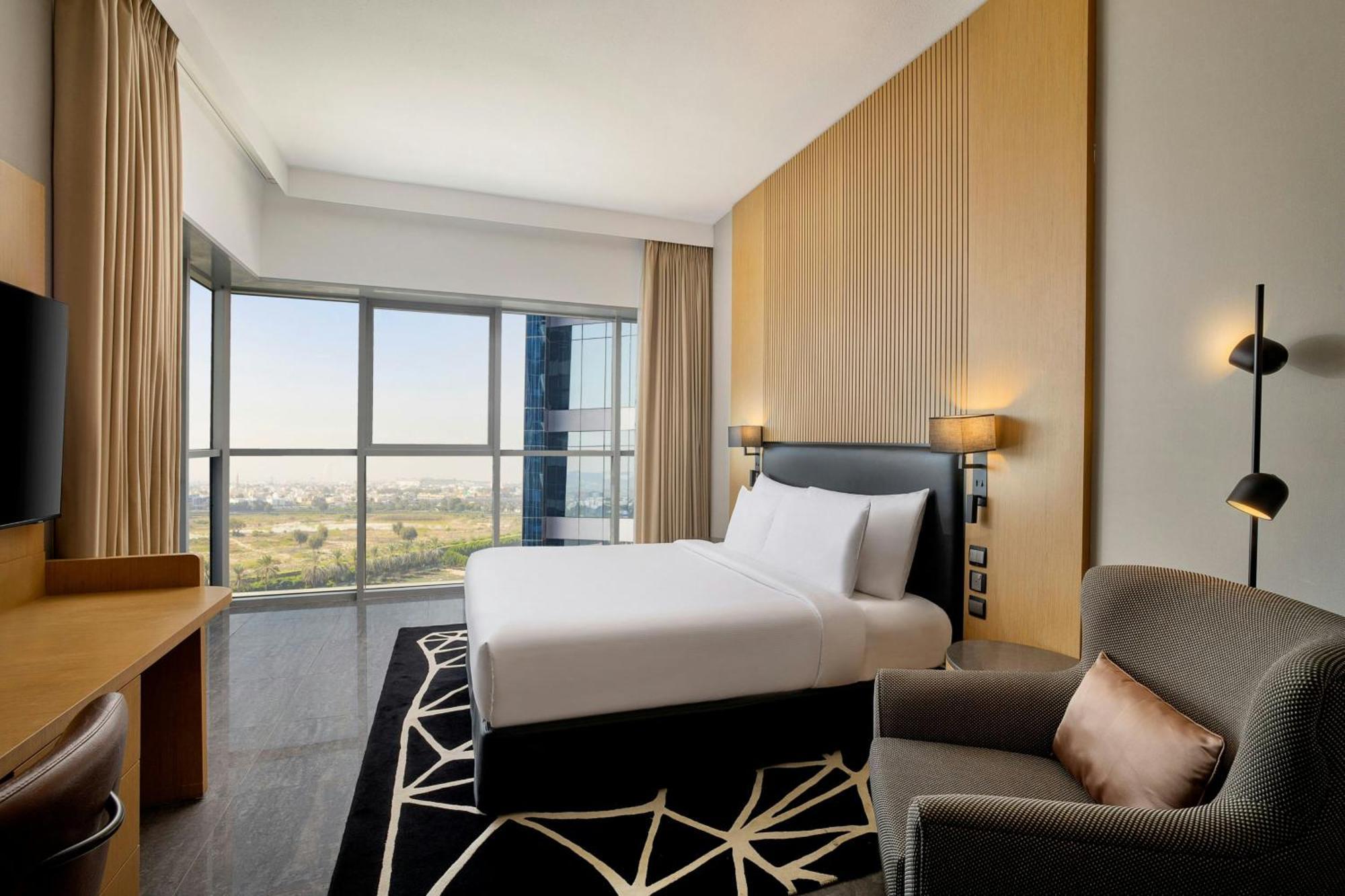 Chambre Lit King-Size Deluxe - Vue sur Ville